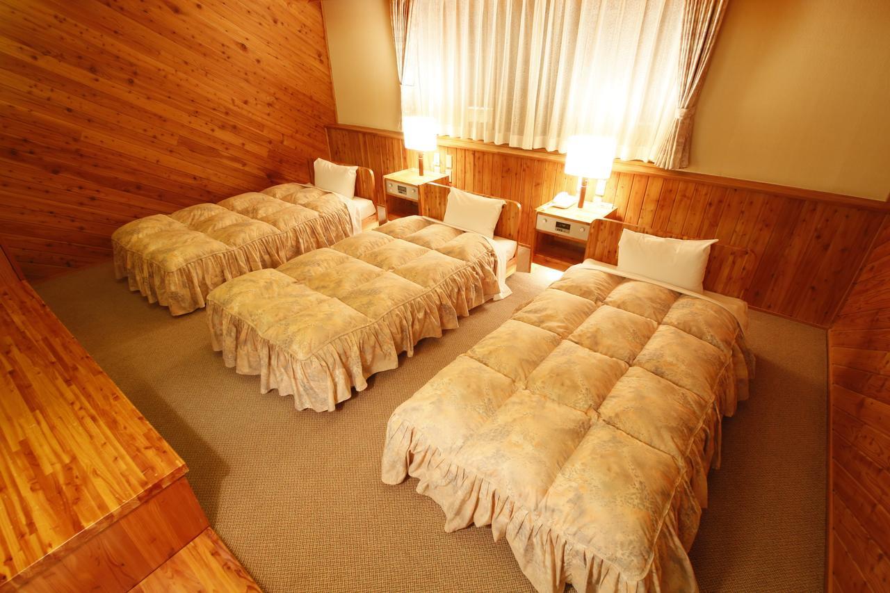 Log Hotel Larch Lake Kanayama Minamifurano Værelse billede
