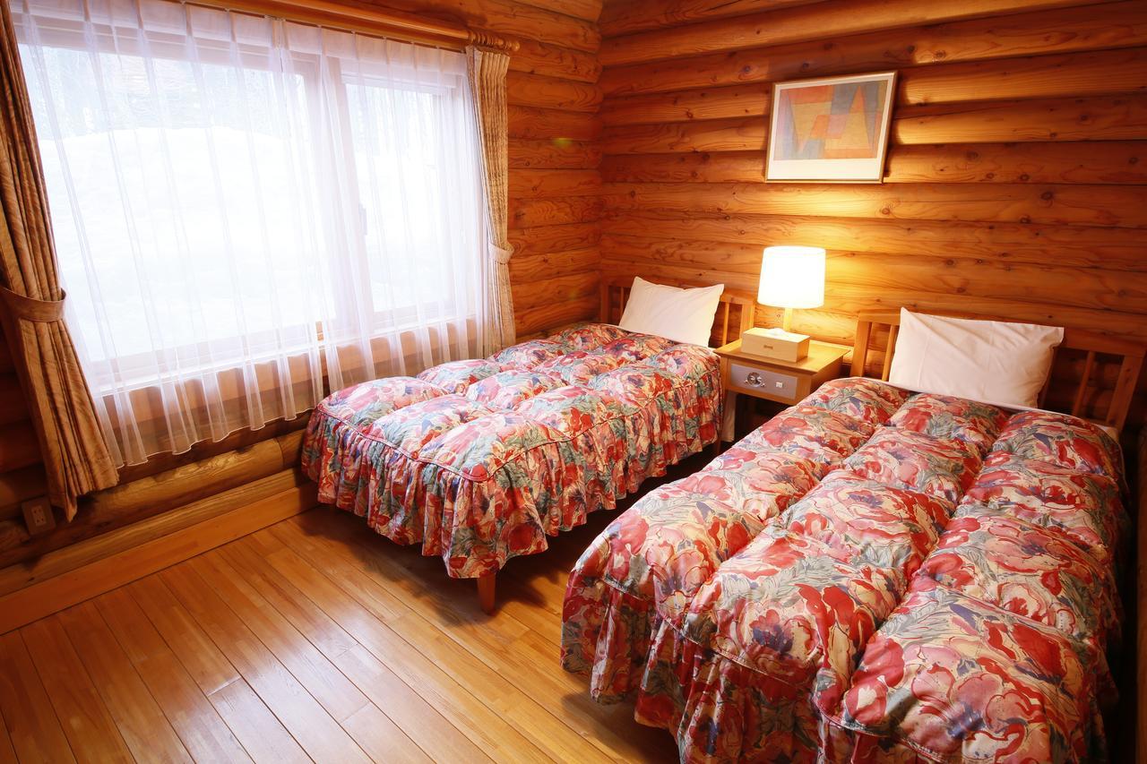 Log Hotel Larch Lake Kanayama Minamifurano Værelse billede