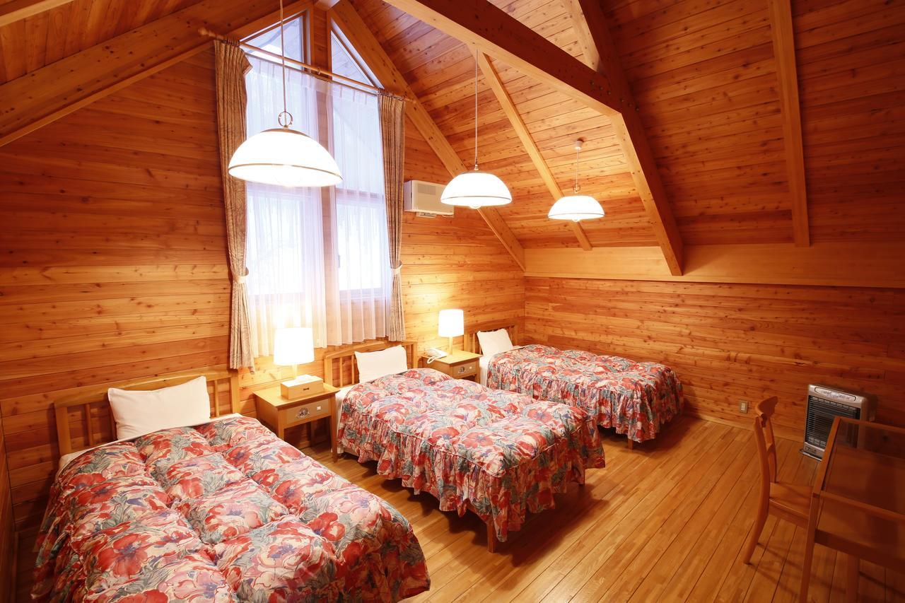 Log Hotel Larch Lake Kanayama Minamifurano Værelse billede