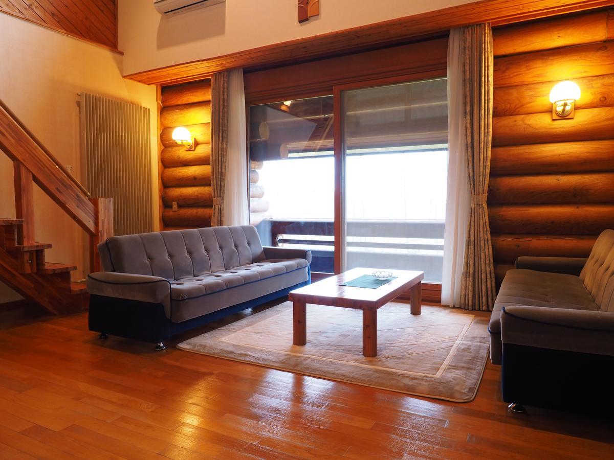 Log Hotel Larch Lake Kanayama Minamifurano Værelse billede